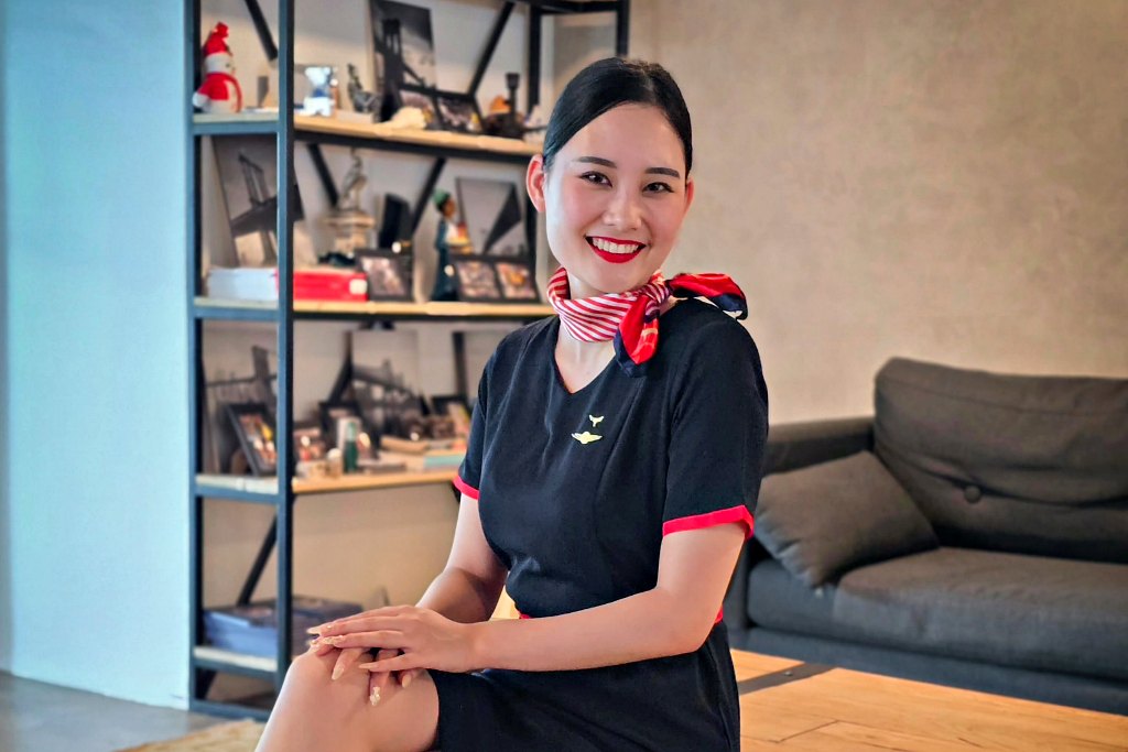 Yuna in Crew Lounge cabin crew training uniform at the training facility